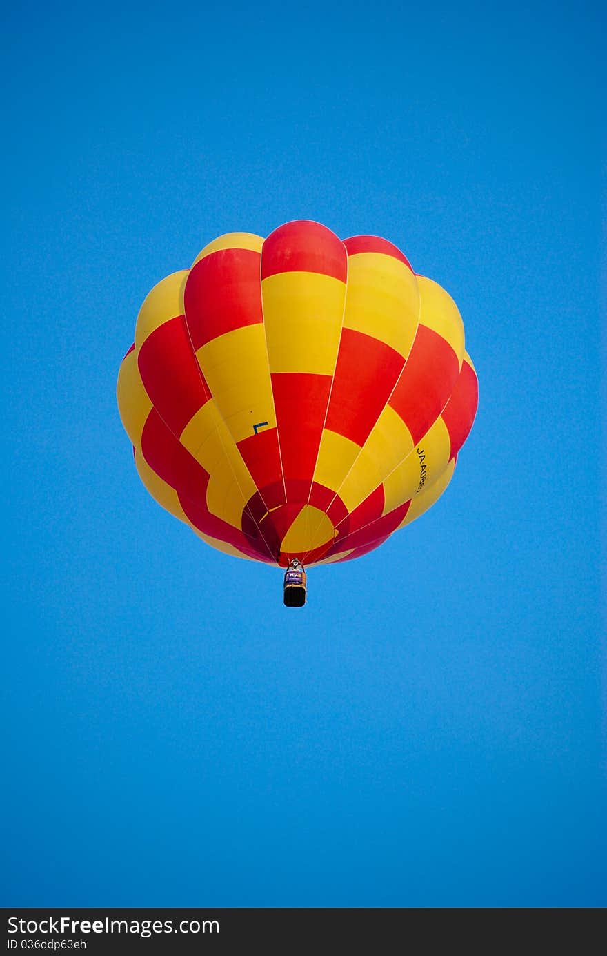 Red & Yellow Balloon On The Blue Sky.