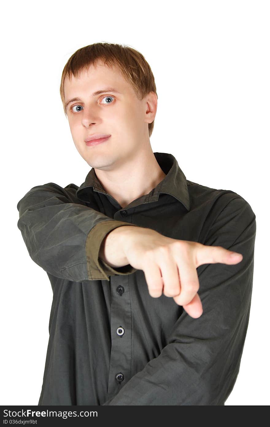 Young handsome man in grey shirt pointing for finger at side, isolated. Young handsome man in grey shirt pointing for finger at side, isolated