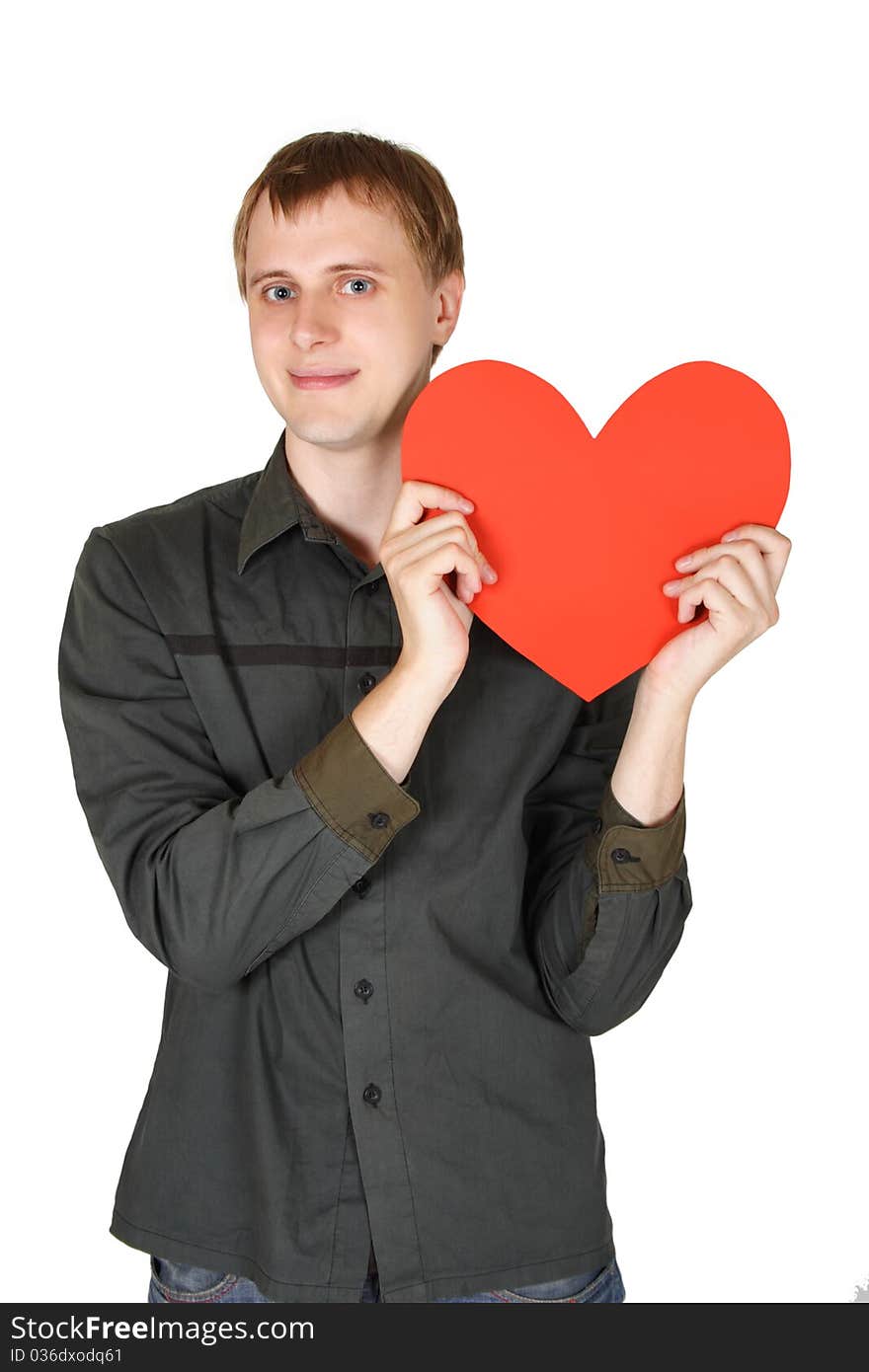 Young caucasian man holding red paper heart, declaration of love, isolated