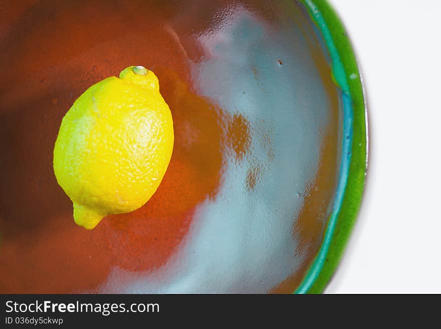 Yellow lemon colorful bowl white background