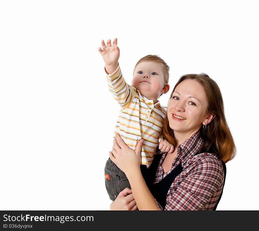 Young mother having fun with her little son on the floor