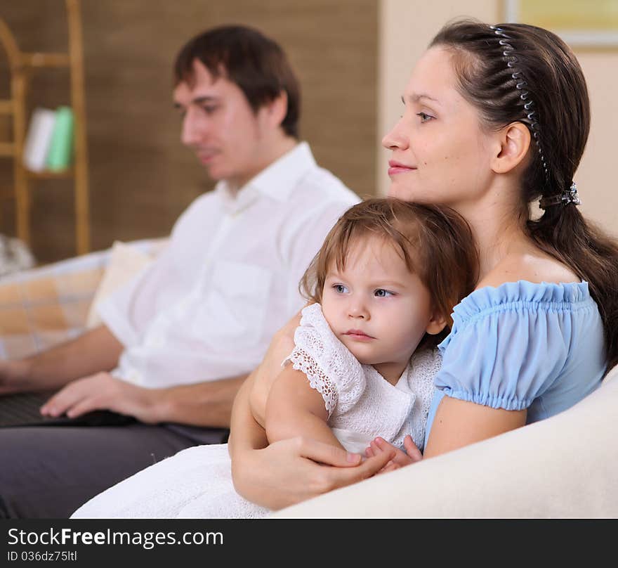 Young mother with a little daughter together at home. Young mother with a little daughter together at home