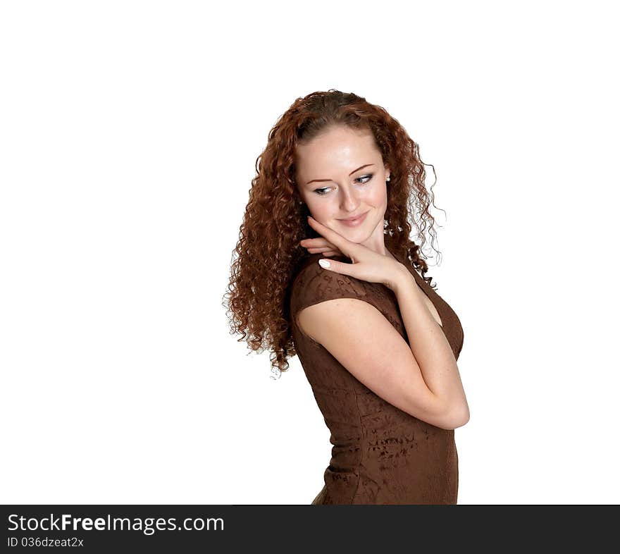 A young woman in studio in a dress