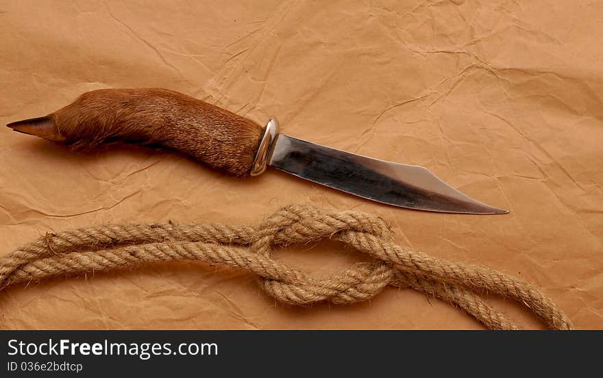 Hunting knife and rope