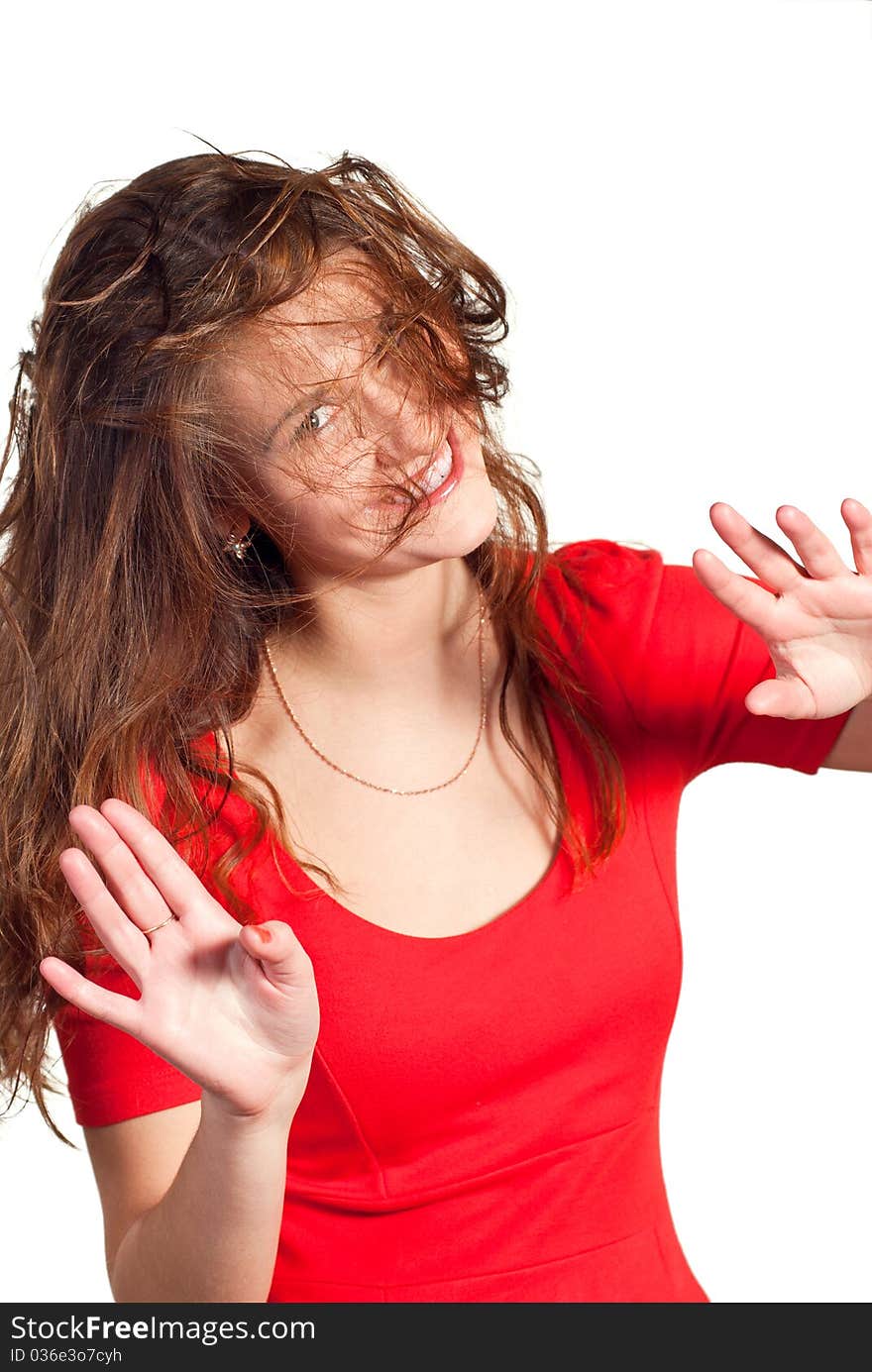 Portrait of a smiling young woman with flying hair. Isolated on white background. Portrait of a smiling young woman with flying hair. Isolated on white background.