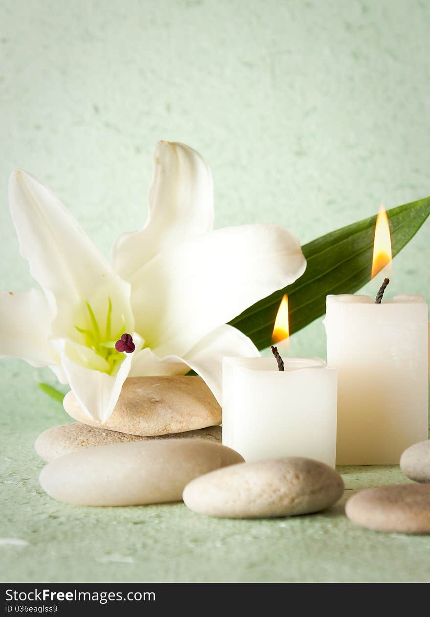 Spa elements with lily and zen stones.