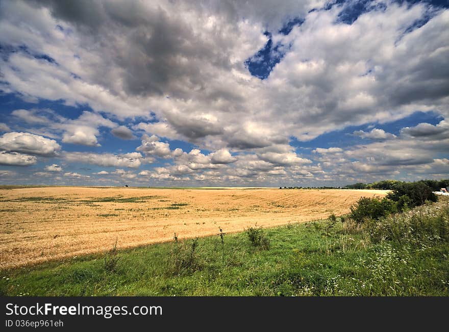 Landscape with beautiful clouds on blue sky