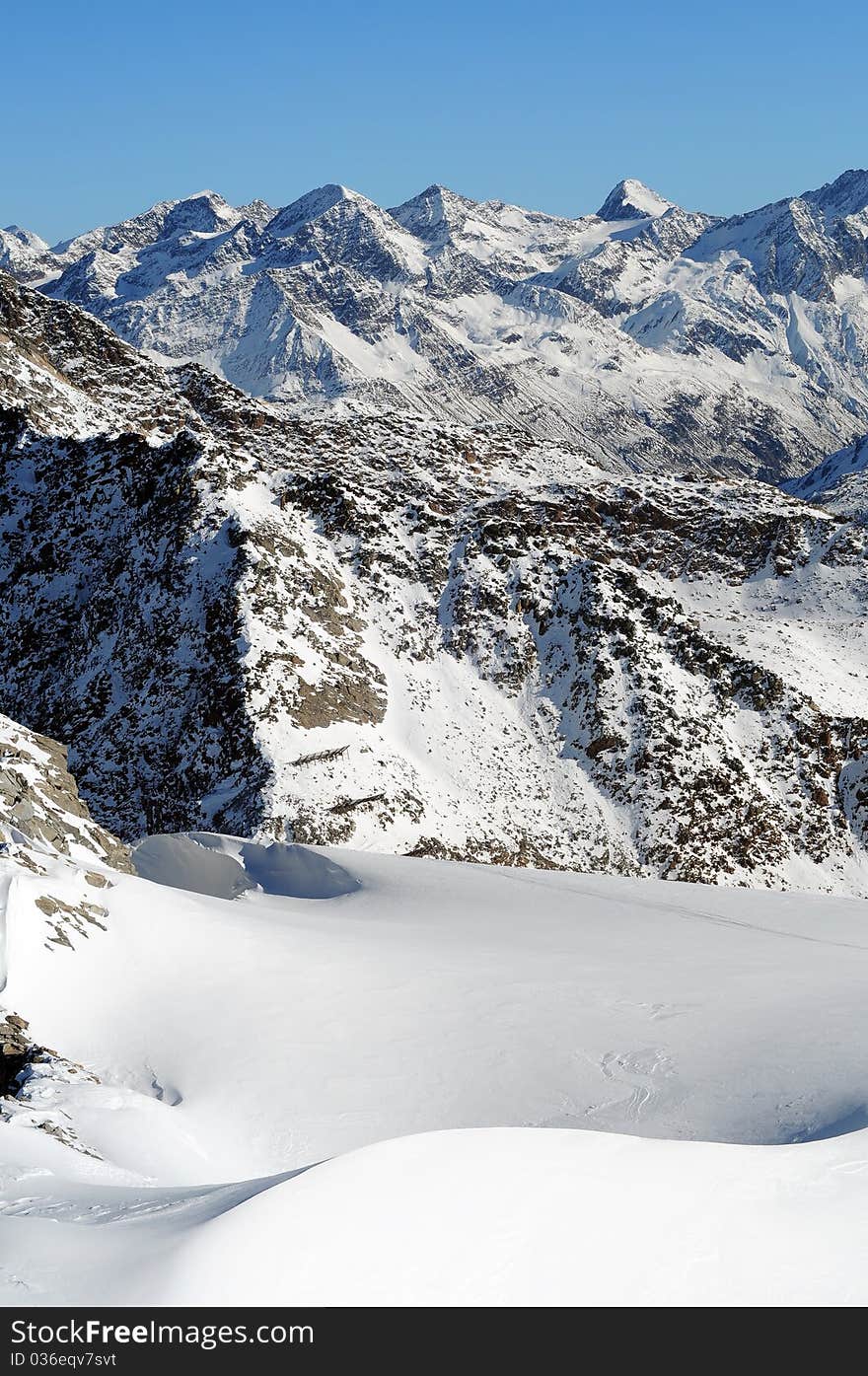 Beautiful winter mountains. European Alps. Lots of snow.