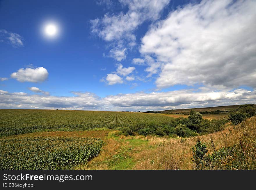 Landscape with beautiful clouds on blue sky