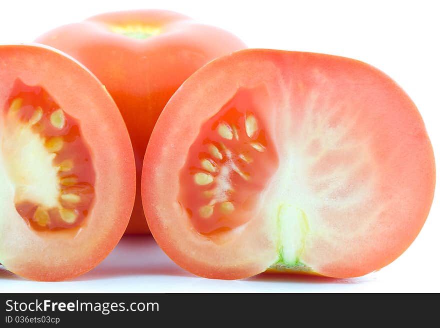 Section of tomato isolated on white