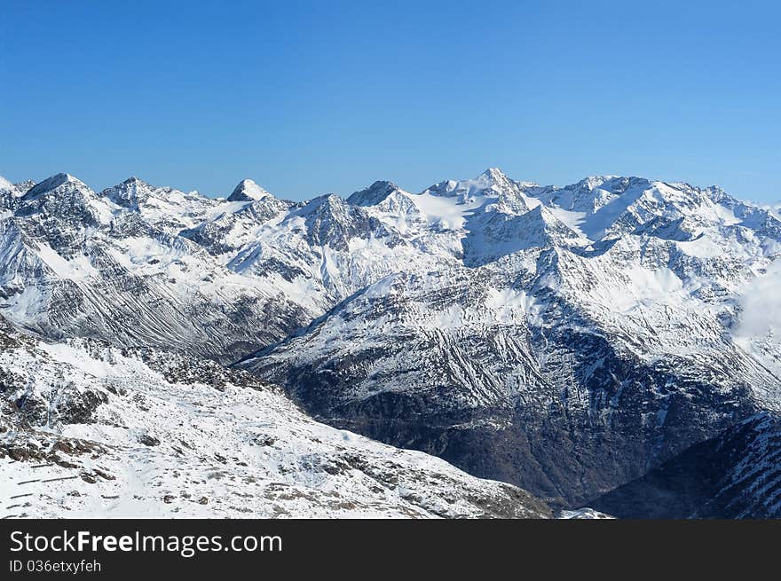 Beautiful winter mountains. Scenic view of Austrian Alps. Beautiful winter mountains. Scenic view of Austrian Alps