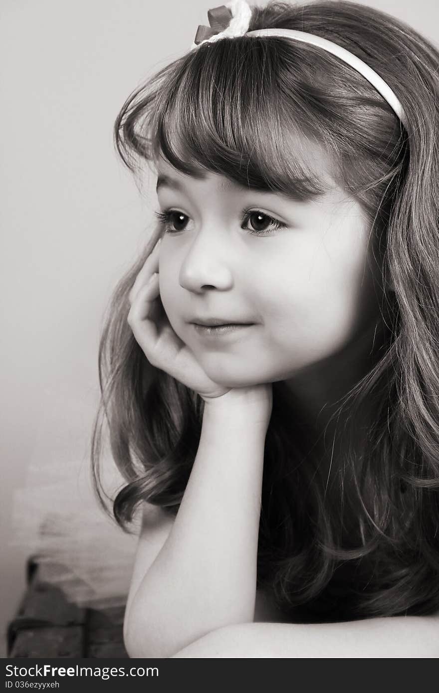 Beautiful little girl wearing a head band. Beautiful little girl wearing a head band