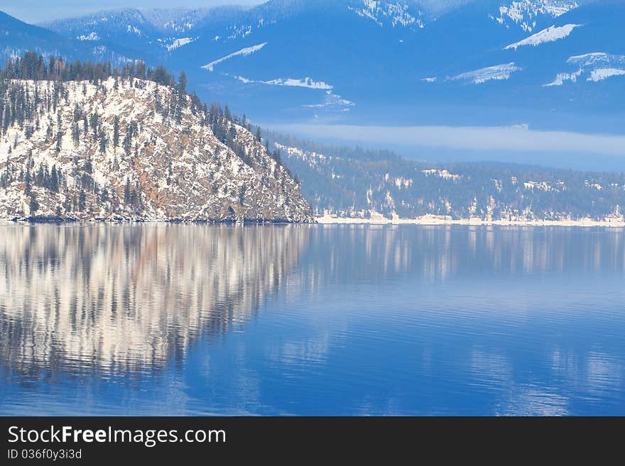 Reflection of Mountain Island and blue skies. Reflection of Mountain Island and blue skies