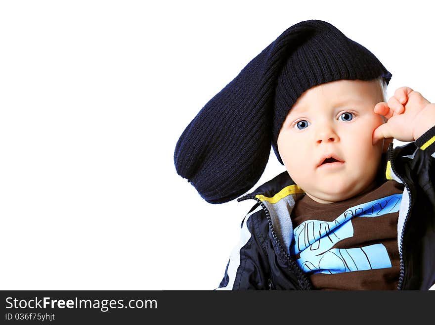 Beautiful little boy. Shot in a studio. Isolated over white background. Beautiful little boy. Shot in a studio. Isolated over white background.