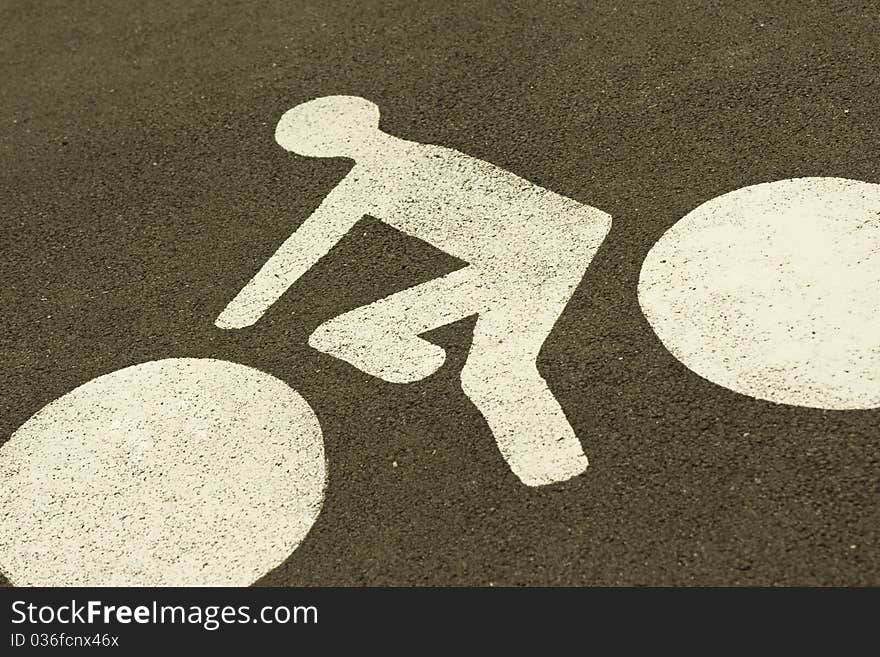 Road with cycling sign symbol.