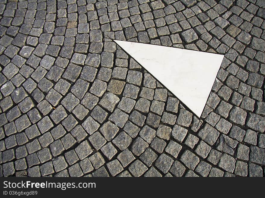 Cobble stones with traffic sign