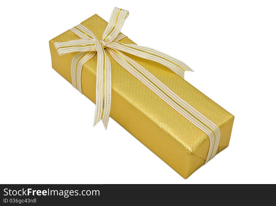 Gold gift box with gold ribbon on white background.