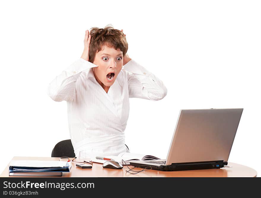 Beautiful businesswoman working with laptop at her office