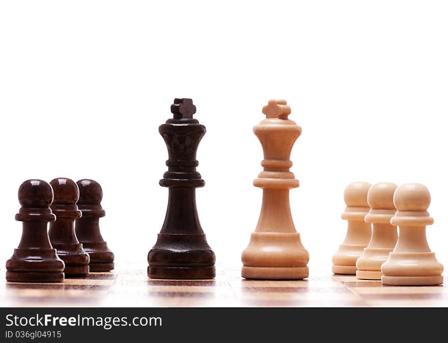 Black and white chess pieces isolated on a white background