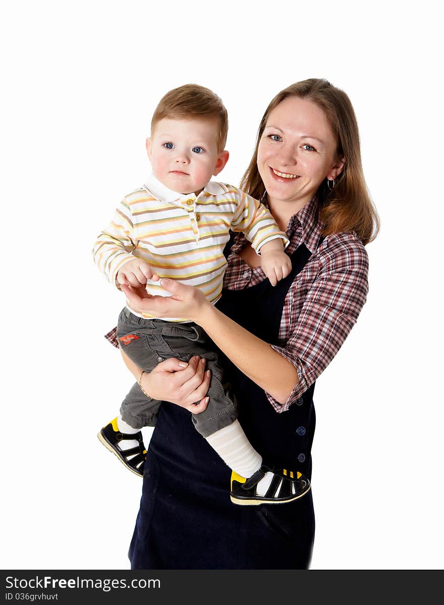 Young mother having fun with her little son on the floor