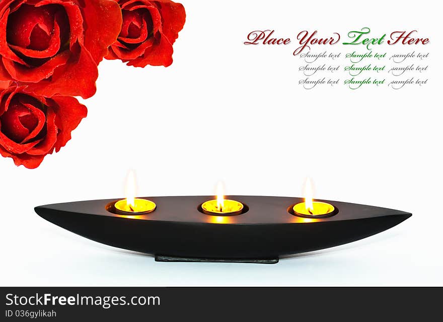 Red roses and aromatherapy candles. Red roses and aromatherapy candles