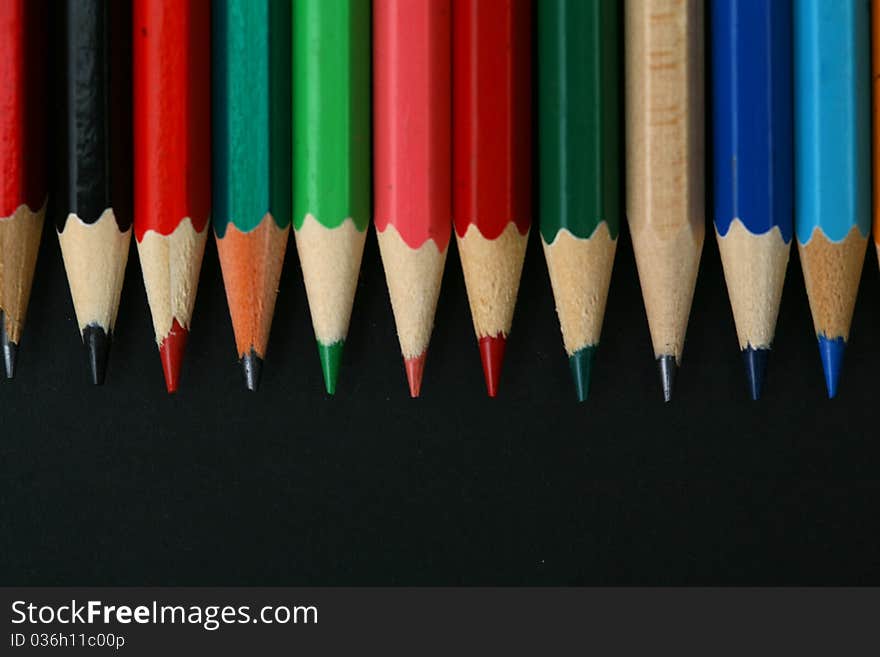 Background-color close-up image of a pencil. Background-color close-up image of a pencil