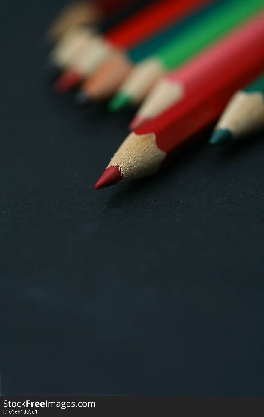 Background-color close-up image of a pencil. Background-color close-up image of a pencil