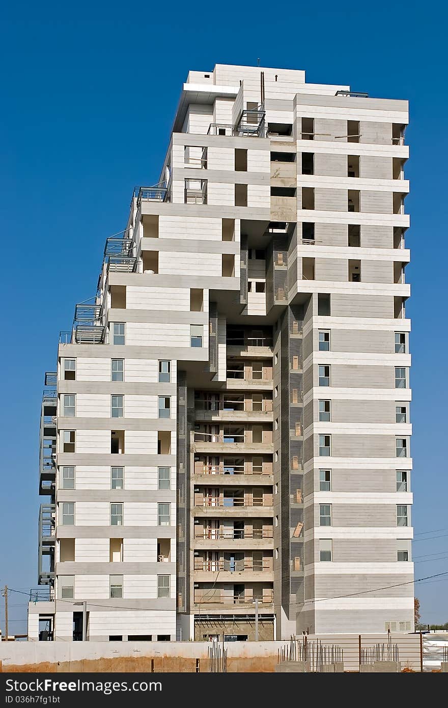 Residential building construction site and blue sky