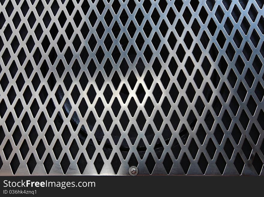 Loudspeaker front with metal net, background