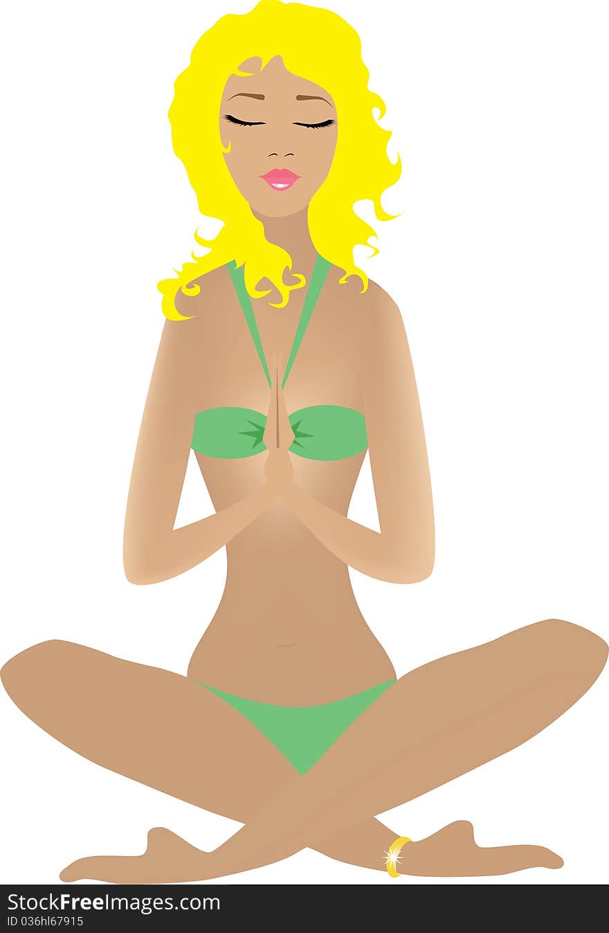 A woman in a green bikini meditating. A woman in a green bikini meditating