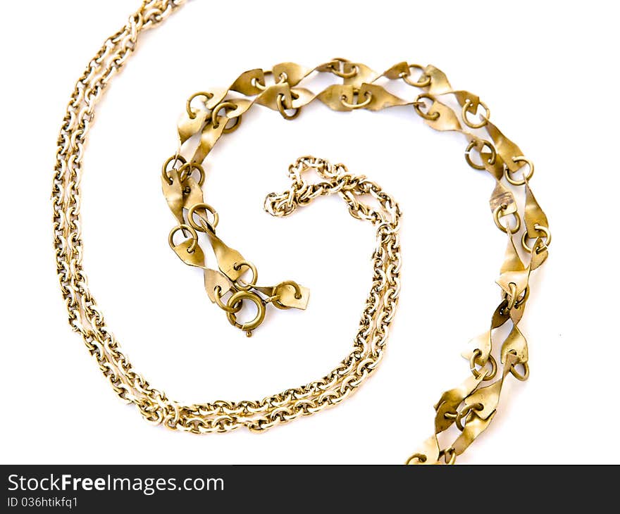 Two golden necklaces on white background. Two golden necklaces on white background