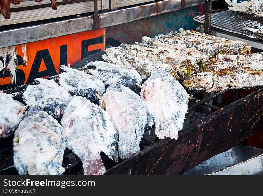 Grilled fish on stove for sale