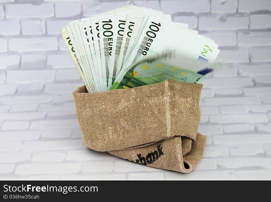 A bag with many Euro banknotes. A bag with many Euro banknotes