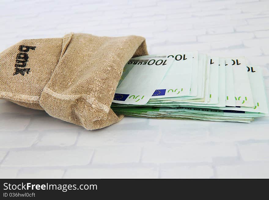 A bag with many Euro banknotes. A bag with many Euro banknotes