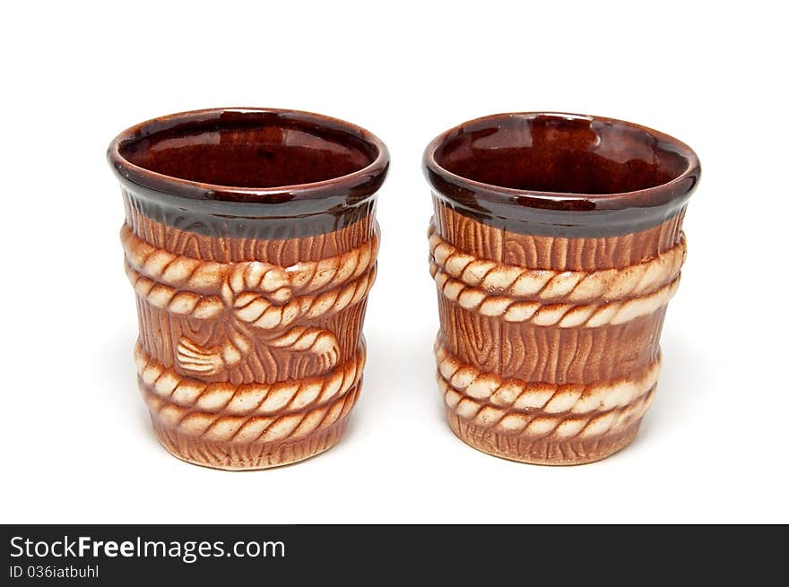 2 brown decorative cups