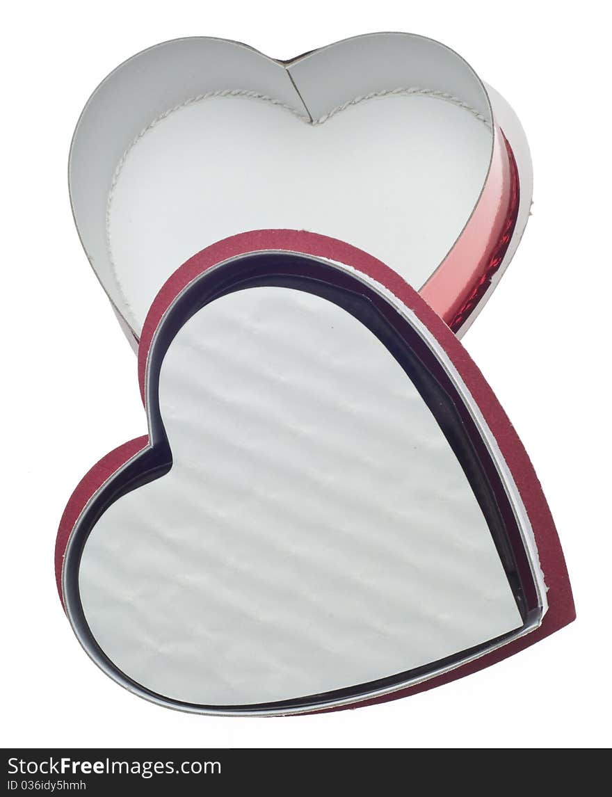 Valentines Day Candy Hidden on a Heart Shaped Box Isolated on White with a Clipping Path.