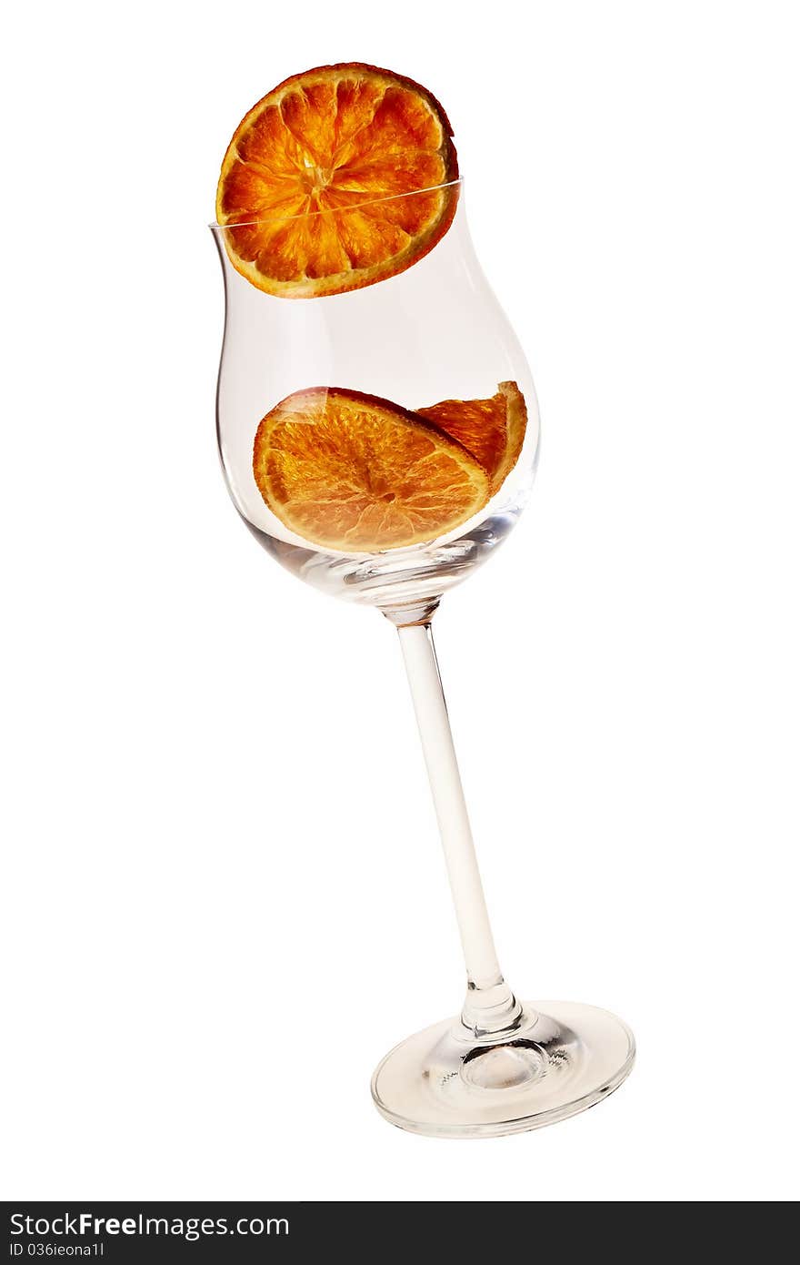 Wineglass with dried orange slice.