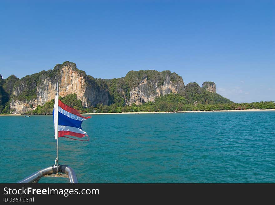 Limestone cliffs in Krabi province and flag of Thailand. Limestone cliffs in Krabi province and flag of Thailand