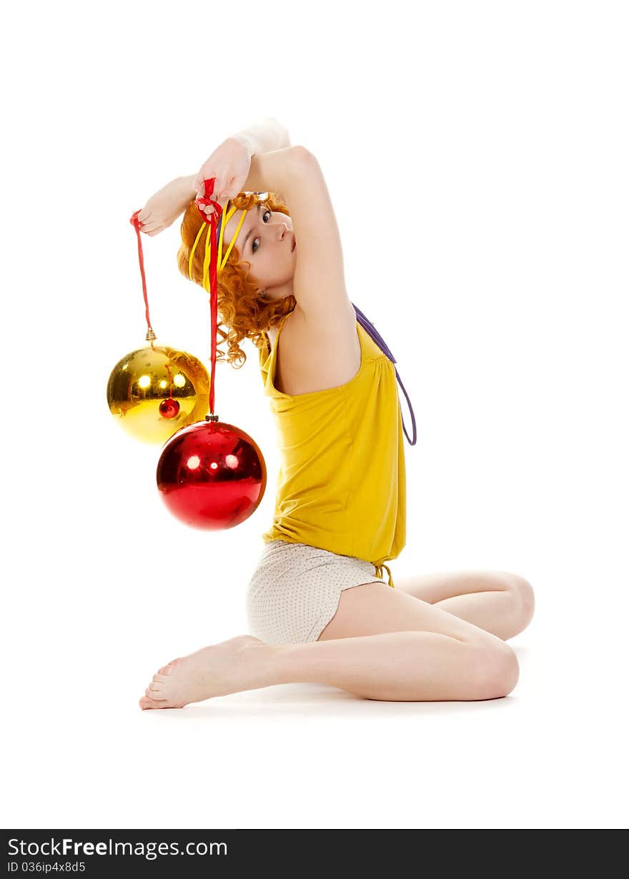 Cute redhead posing with balls