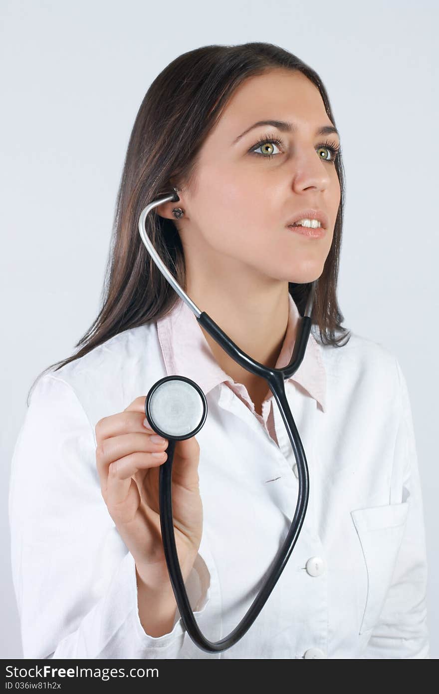 Portrait of friendly female doctor with stethoscope. Portrait of friendly female doctor with stethoscope.