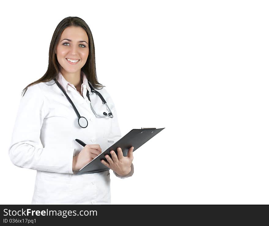 Portrait of friendly female doctor with stethoscope writes on the clipboard. Portrait of friendly female doctor with stethoscope writes on the clipboard.