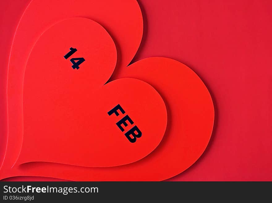 Valentine s Day dated in red heart isolated on red. Valentine s Day dated in red heart isolated on red