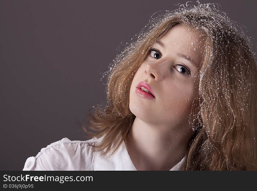 Portrait Teenage Girl With Snow In Hair