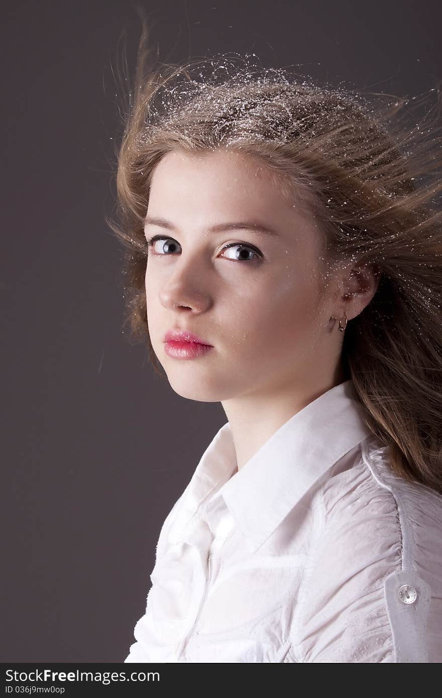 Portrait Teenage Girl With Snow In Hair