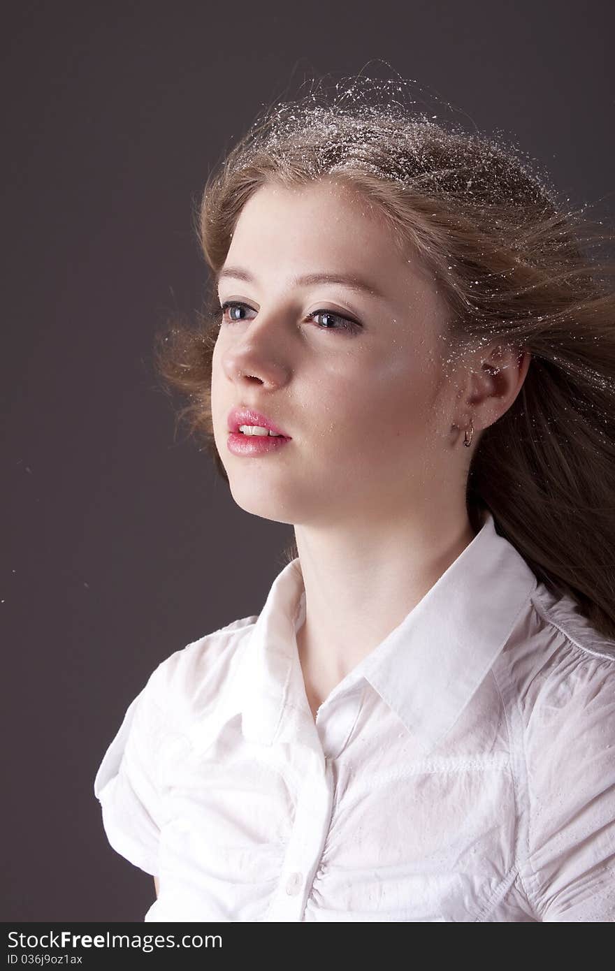 Portrait teenage girl with snow in hair