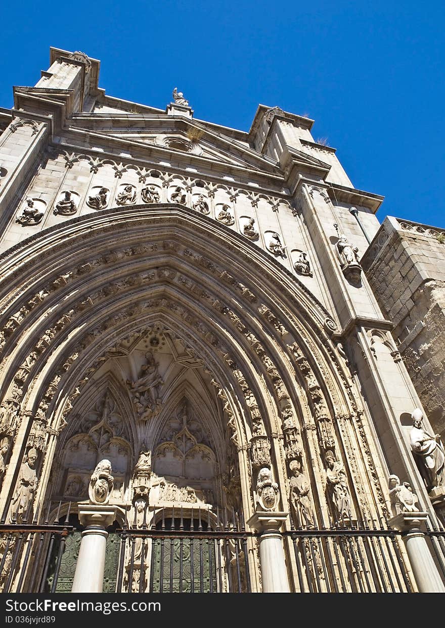 Toledo Cathedral gate in a summer evening