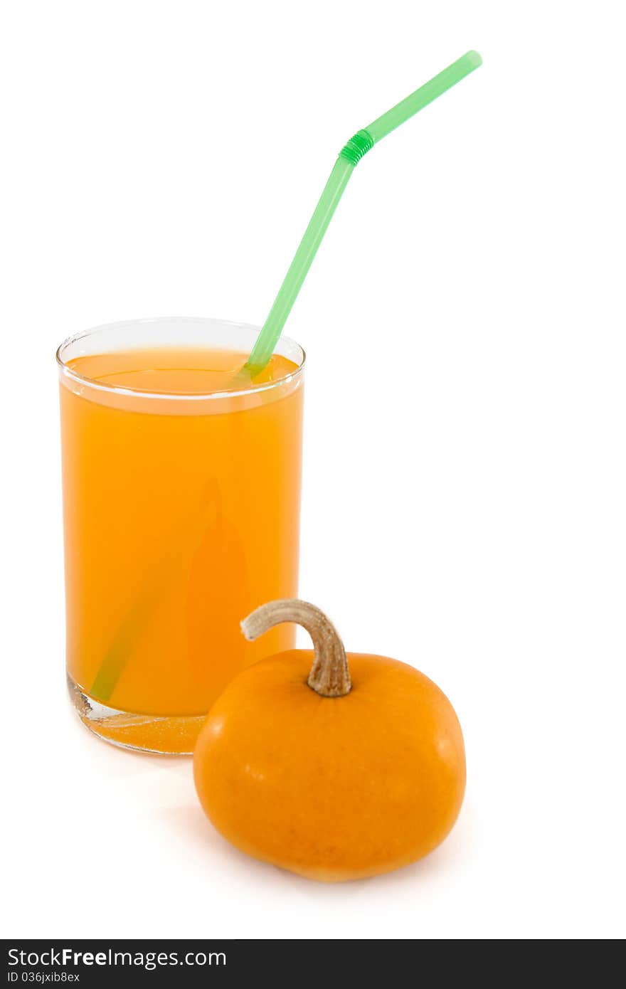 Pumpkin juice in a glass, isolated, white background