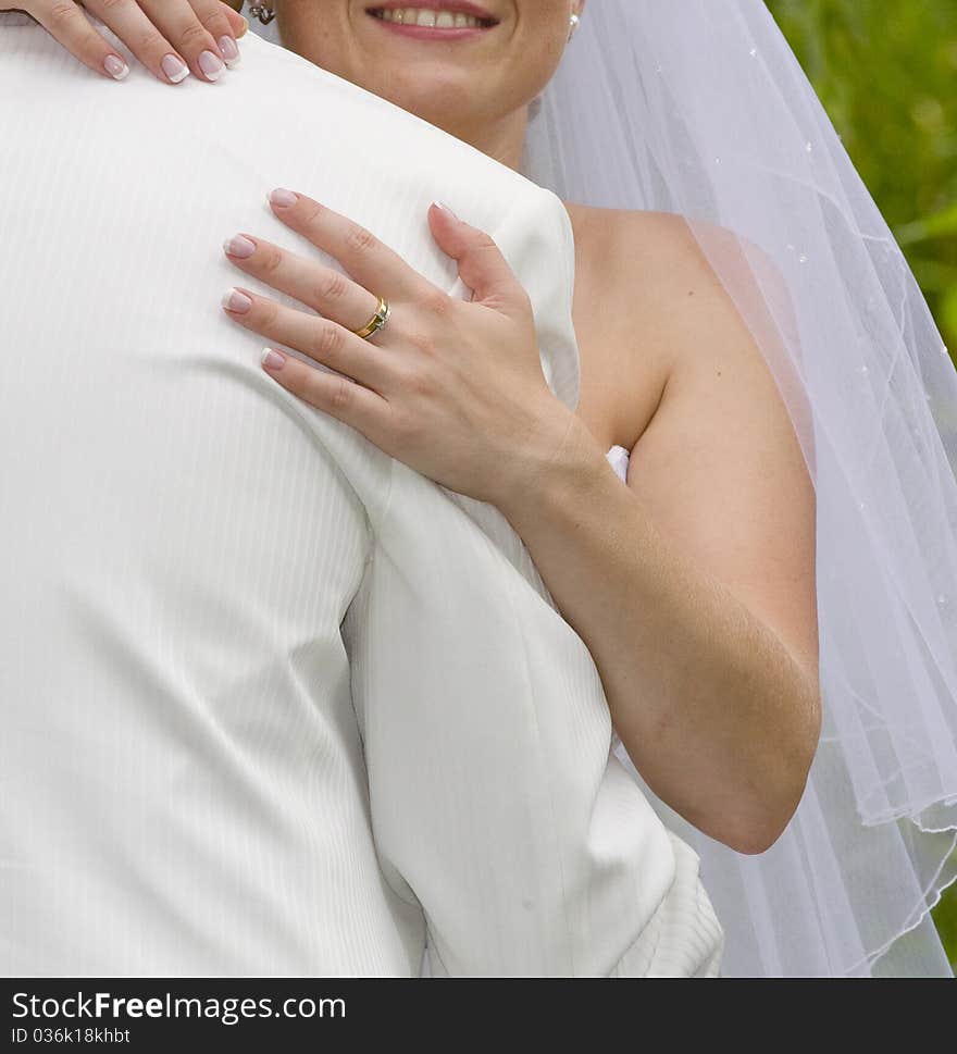 Bride inarms fiance with love and smiles. Bride inarms fiance with love and smiles