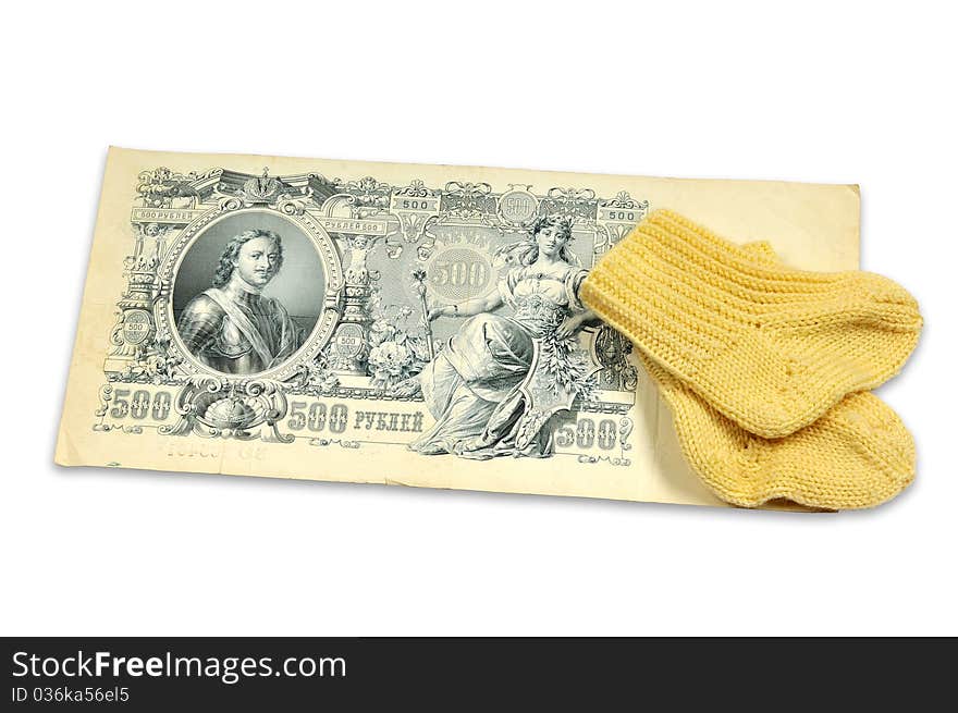 Old banknote and baby sock. Old banknote and baby sock