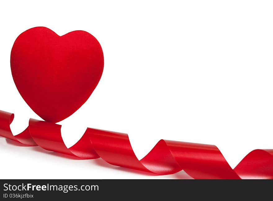 Ribbon and red heart on a white background. Ribbon and red heart on a white background.